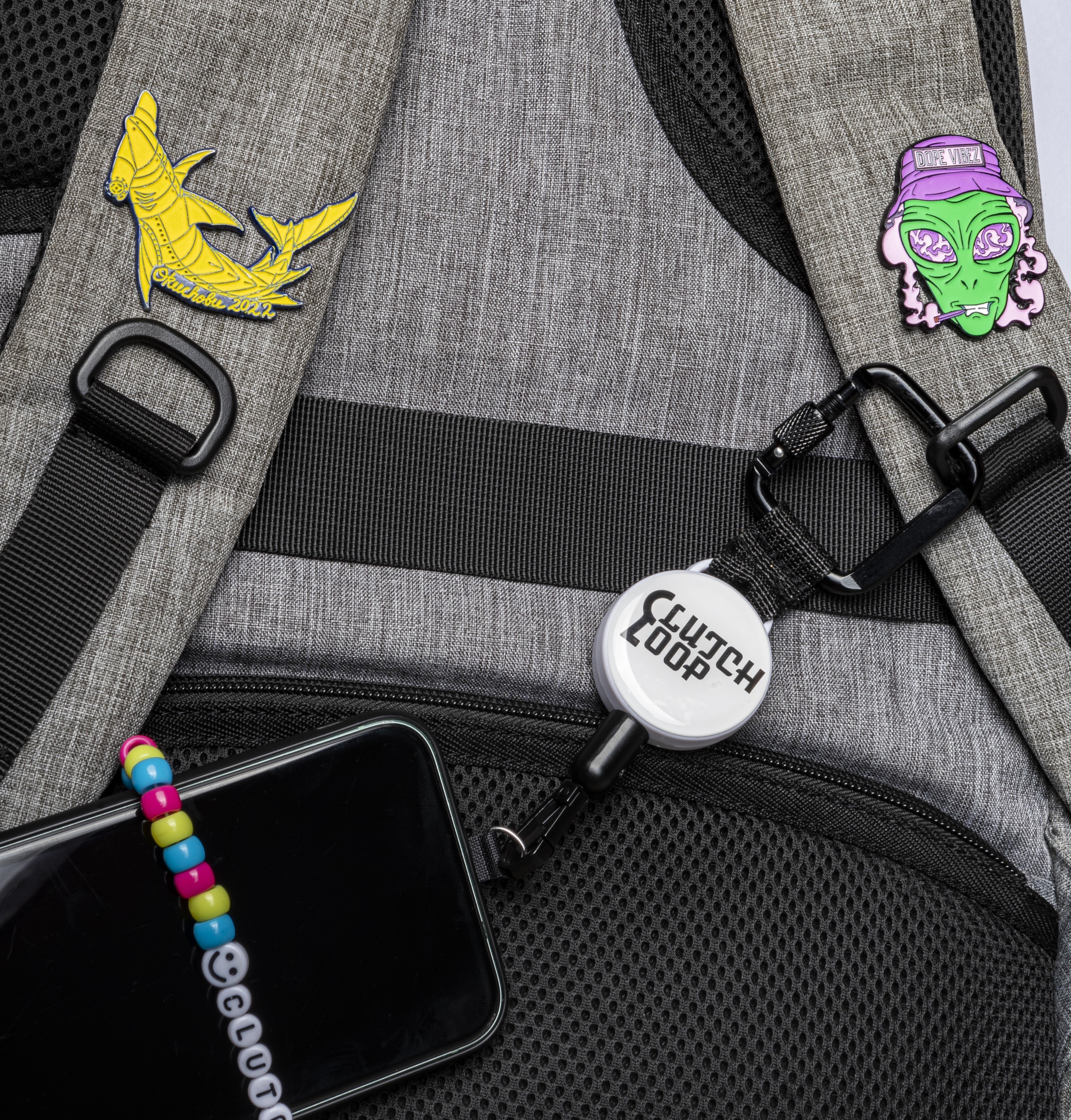 ClutchLoop attached to a backpack