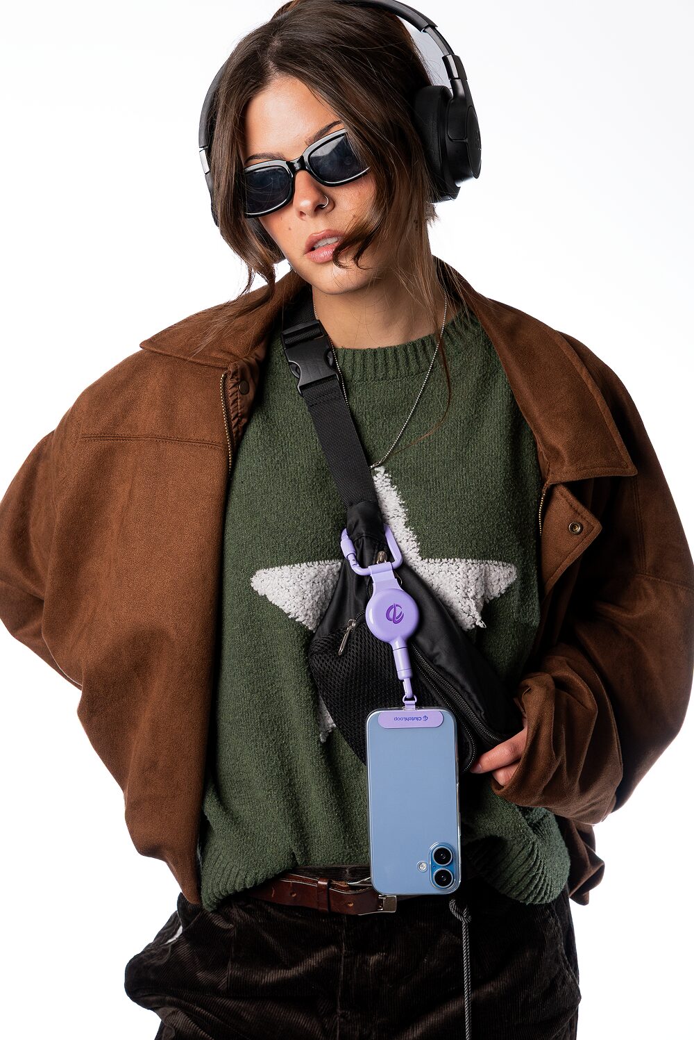 Streetwear outfit with a Lavender ClutchLoop phone tether